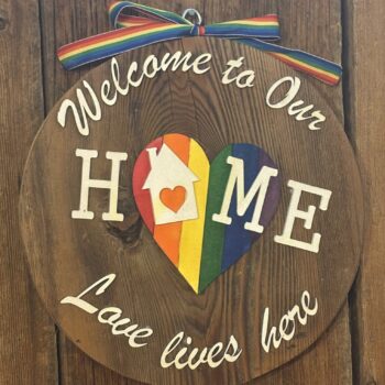 Love Lives Here wall hanging